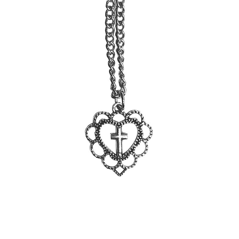 Collier avec pendentif en forme de croix en forme de cœur creux de style gothique punk